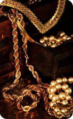 gold jewelry and chains to represent the golden wedding