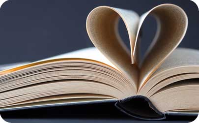 Book with pages folded into a loveheart shape to represent research for the history